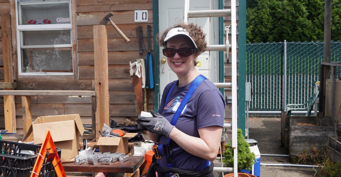 Smiling Volunteer at Solar Installation